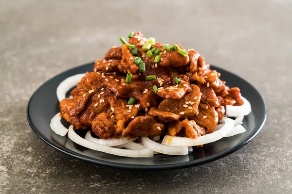 Fried pork with spicy korean sauce (bulgogi) — Stock Photo, Image
