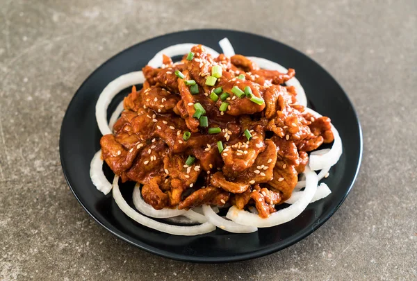 Fried pork with spicy korean sauce (bulgogi) — Stock Photo, Image