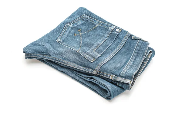 Jeans piegati su sfondo bianco — Foto Stock