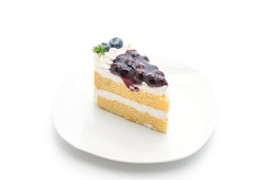 beyaz zemin üzerine üzümlü kek