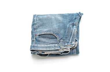 Beyaz arka plan üzerinde katlanmış kot