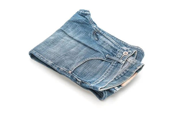 Jeans gefaltet auf weißem Hintergrund — Stockfoto