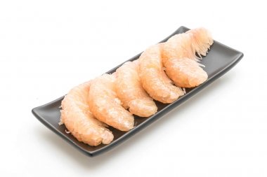 beyaz zemin üzerine taze pomelo