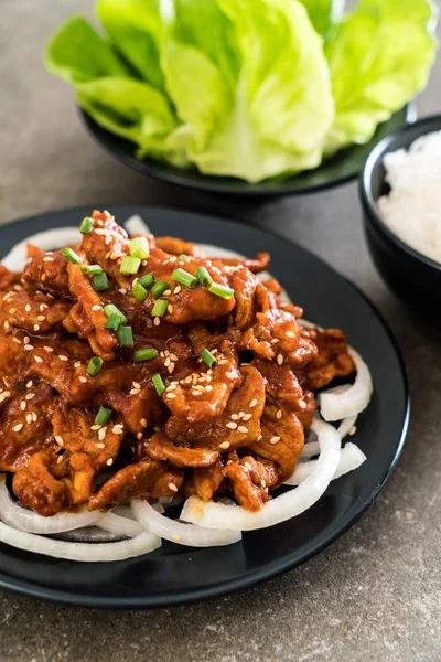 Fried pork with spicy korean sauce (bulgogi) — Stock Photo, Image