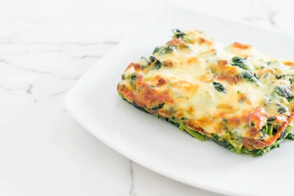 Baked spinach with cheese — Stock Photo, Image