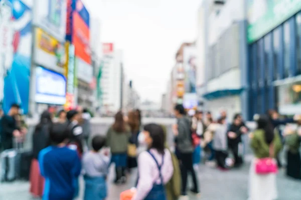 abstract blur crowd people at Osaka street market
