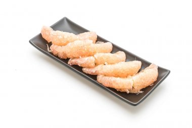 beyaz zemin üzerine taze pomelo