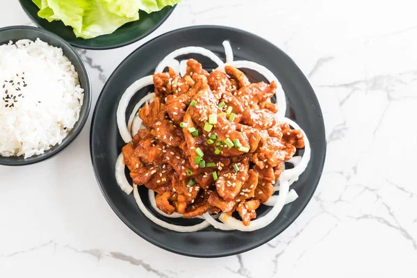 Fried pork with spicy korean sauce (bulgogi) — Stock Photo, Image