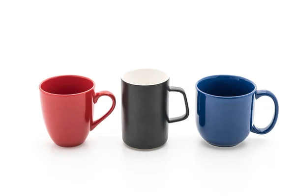 Set schwarzer, roter und blauer Tassen auf weiß — Stockfoto