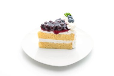 beyaz zemin üzerine üzümlü kek