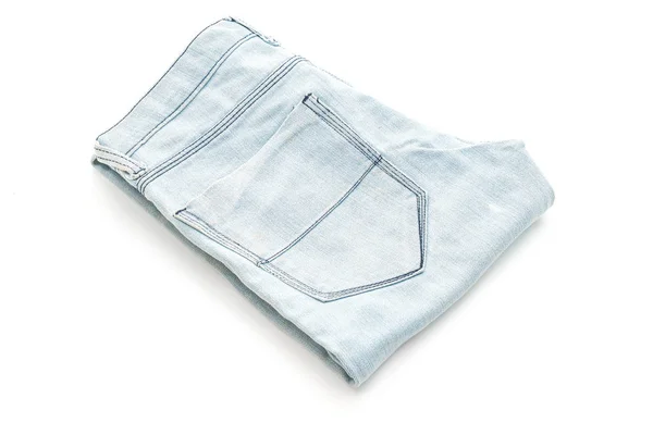 Dżinsy, składany na białym tle — Zdjęcie stockowe