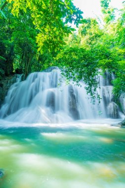 Huay Mae Kamin Waterfall at Kanchanaburi in Thailand clipart