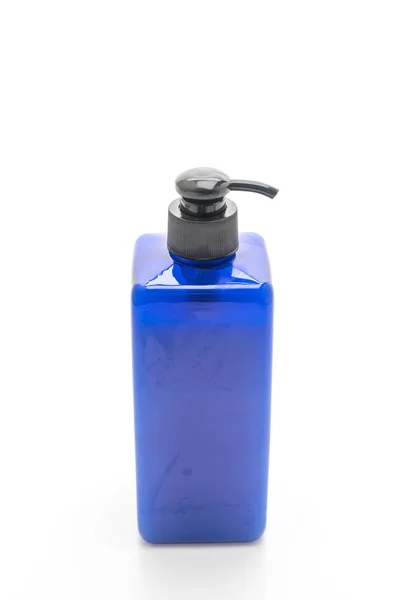 Shampoo ou garrafa de sabão no fundo branco — Fotografia de Stock