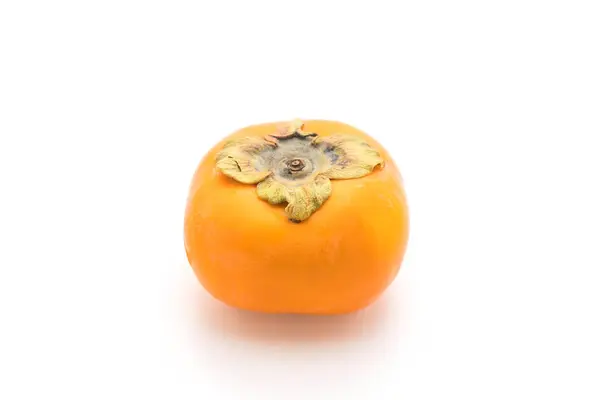 Ferskt persimmon på hvit bakgrunn – stockfoto