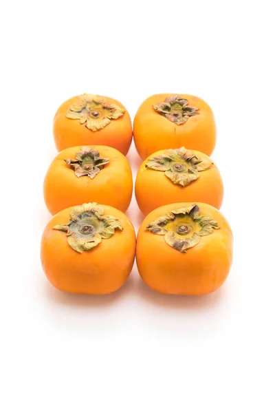 Segar persimmon di latar belakang putih — Stok Foto