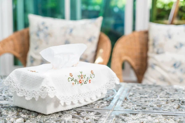 tissue box on table