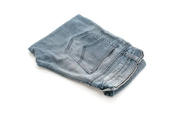 Jeans gevouwen op witte achtergrond — Stockfoto