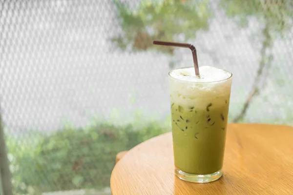 Ice green tea with milk — стоковое фото