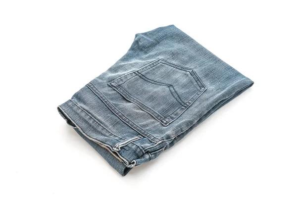 Jeans gevouwen op witte achtergrond — Stockfoto