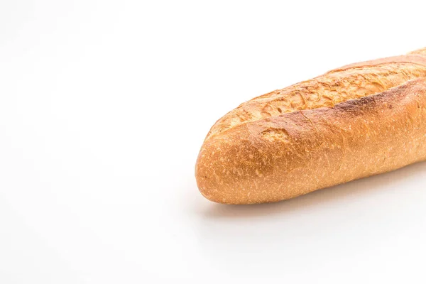 Хлеб багет на белом фоне — стоковое фото