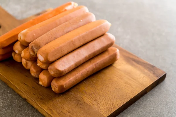 Sausage on wood board — Stock Photo, Image