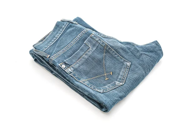 Jeans piegati su sfondo bianco — Foto Stock