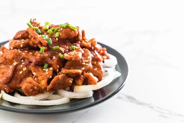 Fried pork with spicy korean sauce (bulgogi) — Stock Photo, Image