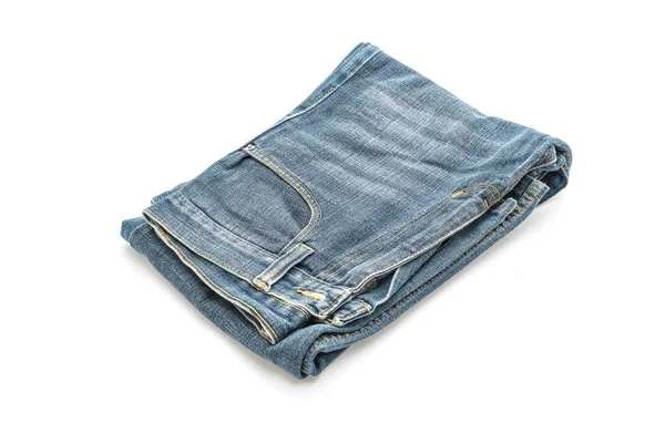 Jeans som viks på vit bakgrund — Stockfoto