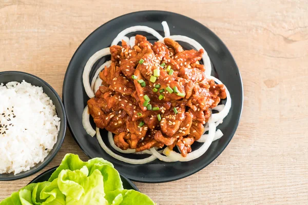 Fried pork with spicy korean sauce (bulgogi) — Stock Photo, Image