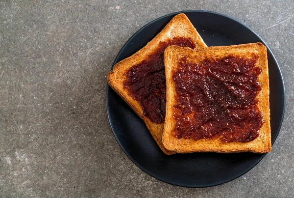 Bread toast with chili paste — Stock Photo, Image