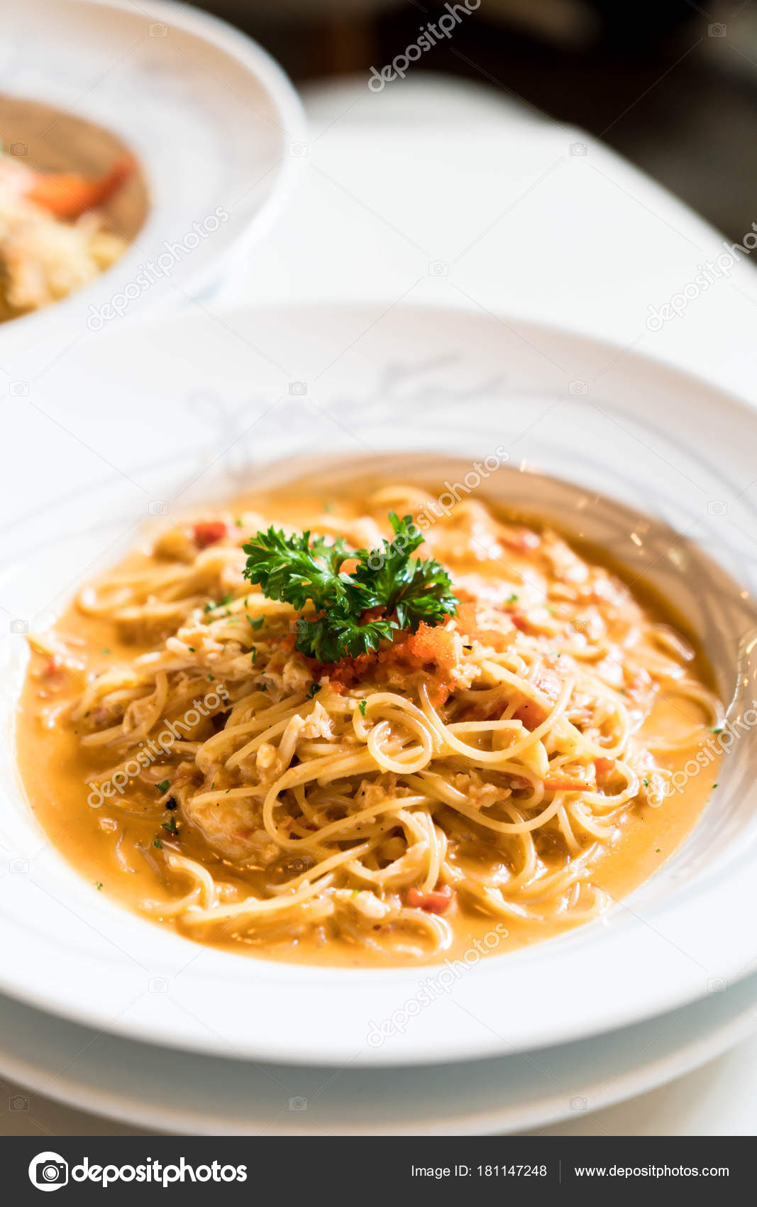 Spaghetti with crab sauce Stock Photo by ©topntp 181147248