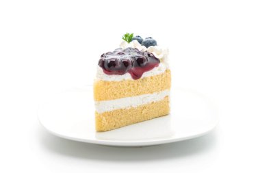 beyaz zemin üzerine üzümlü kek