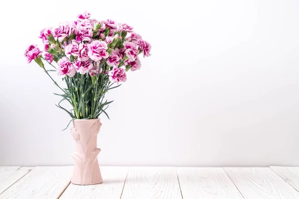 Pink spring flower on wooden background — Stock Photo, Image