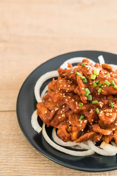 Fried pork with spicy korean sauce (bulgogi) — Stock Photo, Image