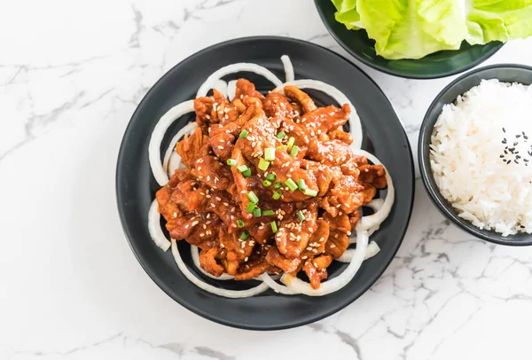 Fried pork with spicy korean sauce (bulgogi) — Stock Photo, Image