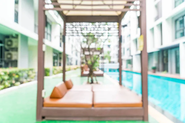 Difuminación abstracta y piscina desenfocada en el complejo hotelero — Foto de Stock