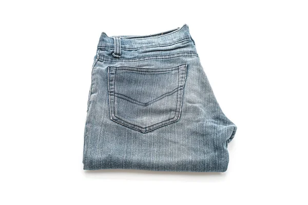 Jeans som viks på vit bakgrund — Stockfoto