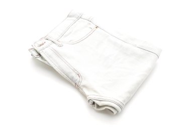 Beyaz arka plan üzerinde katlanmış kot