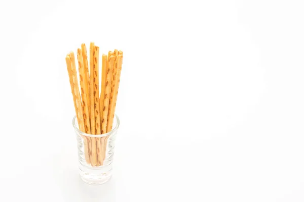 Bâtonnets de biscuit sur fond blanc — Photo