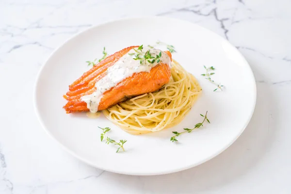 spaghetti with fried salmon