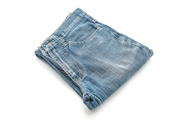Jeans doblados sobre fondo blanco —  Fotos de Stock