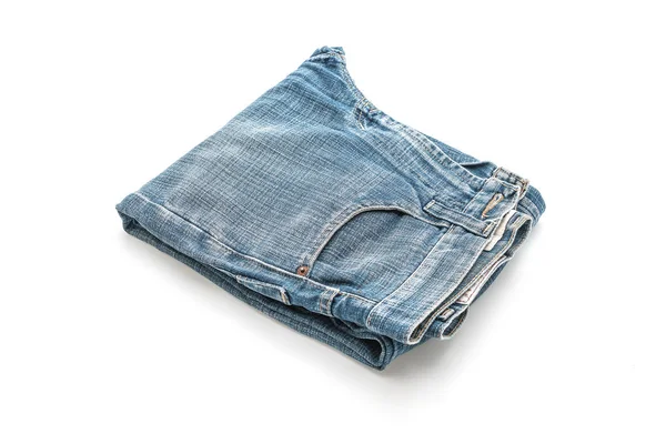 Jeans gevouwen op witte achtergrond — Stockfoto