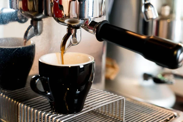 coffee pouring from coffee machine