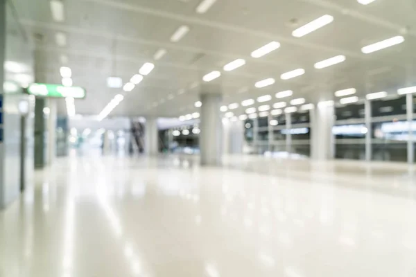 Abstract blur and defocused in empty office building with glass — Stock Photo, Image