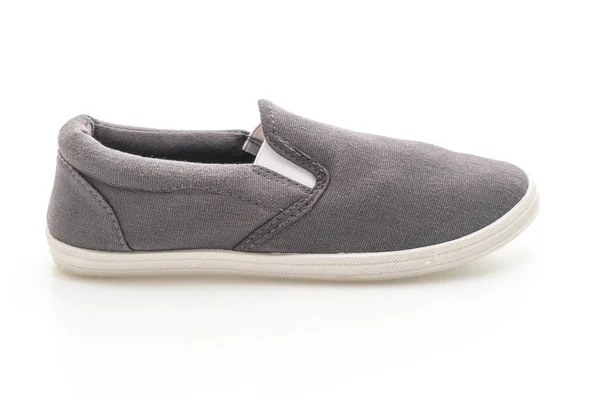 Zapatillas grises sobre fondo blanco —  Fotos de Stock