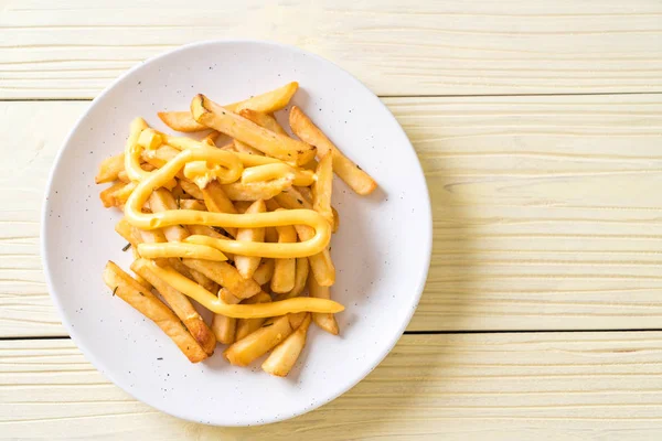 French fries with cheese — Stock Photo, Image