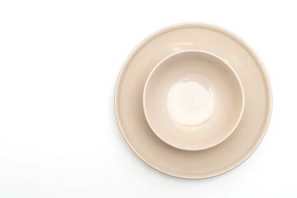 Teller und Schale isoliert auf weißem Hintergrund — Stockfoto