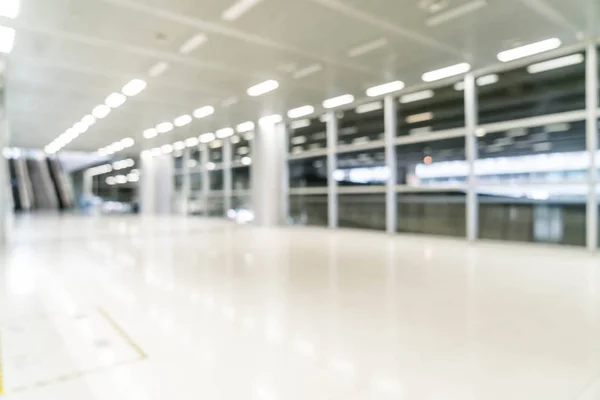 Abstract blur and defocused in empty office building with glass — Stock Photo, Image