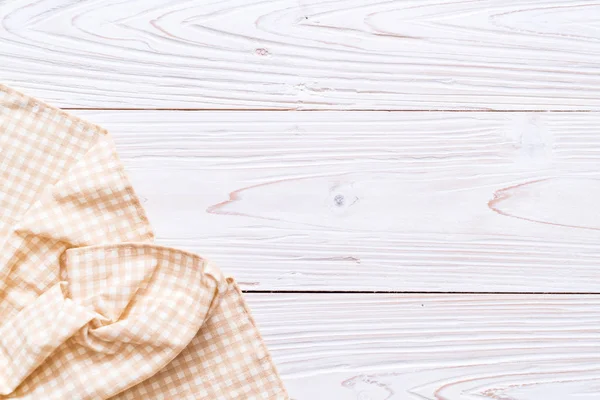 Paño de cocina (servilleta) sobre fondo de madera — Foto de Stock