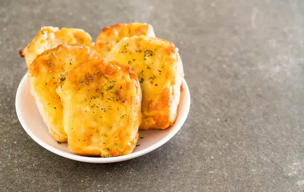Bread toast with cheese and garlic — Stock Photo, Image